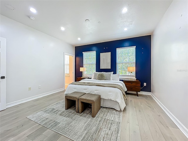 2240 Osprey Ave, Orlando, FL 32814 - bedroom featuring light wood-type flooring and recessed lighting