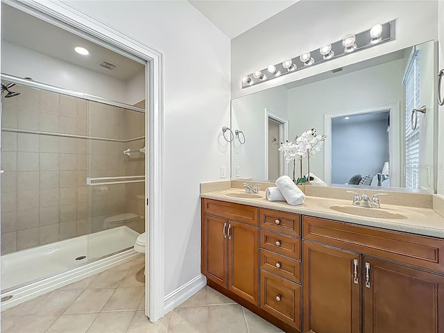 2240 Osprey Ave, Orlando, FL 32814 - full bathroom with tile patterned flooring, double vanity, and a shower stall