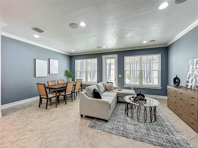 2240 Osprey Ave, Orlando, FL 32814 - living area with crown molding, recessed lighting, light tile patterned floors, and a textured ceiling