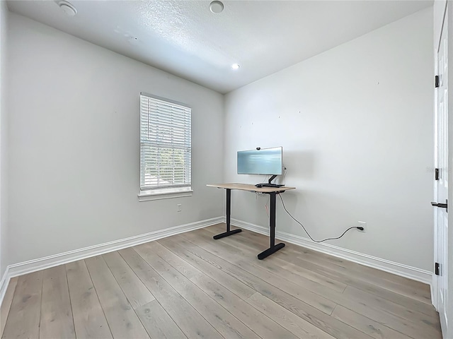 2240 Osprey Ave, Orlando, FL 32814 - unfurnished office featuring wood finished floors and recessed lighting