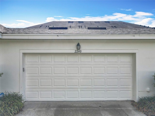 2240 Osprey Ave, Orlando, FL 32814 - garage featuring driveway