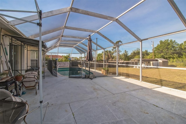 view of patio / terrace featuring a fenced in pool and a lanai