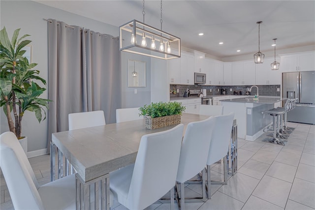 2760 Bookmark Dr, Kissimmee, FL 34746 - dining space with light tile patterned flooring and recessed lighting