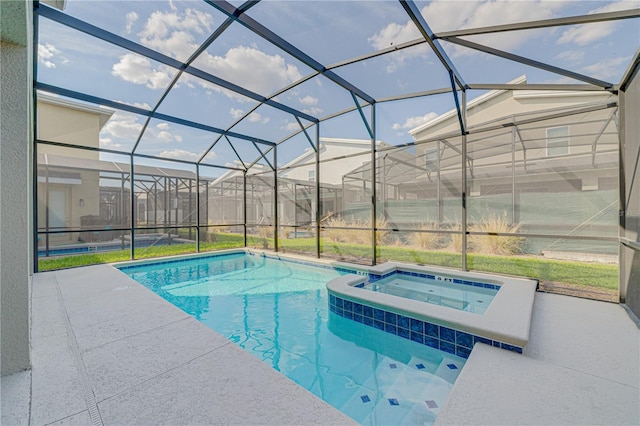 2760 Bookmark Dr, Kissimmee, FL 34746 - view of pool featuring a pool with connected hot tub, glass enclosure, and a patio area