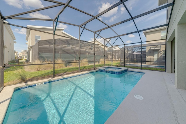 2760 Bookmark Dr, Kissimmee, FL 34746 - view of swimming pool featuring a pool with connected hot tub, a lanai, and a patio