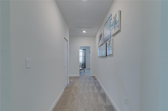 2760 Bookmark Dr, Kissimmee, FL 34746 - corridor with baseboards and light colored carpet