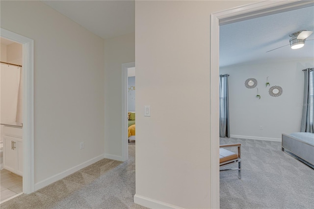 2760 Bookmark Dr, Kissimmee, FL 34746 - hallway featuring baseboards and carpet floors