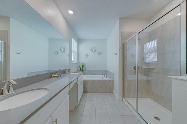 2760 Bookmark Dr, Kissimmee, FL 34746 - full bathroom featuring a shower stall, a sink, and a garden tub