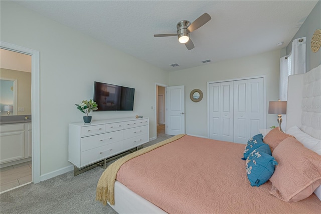 2760 Bookmark Dr, Kissimmee, FL 34746 - bedroom with carpet flooring, connected bathroom, a closet, and visible vents