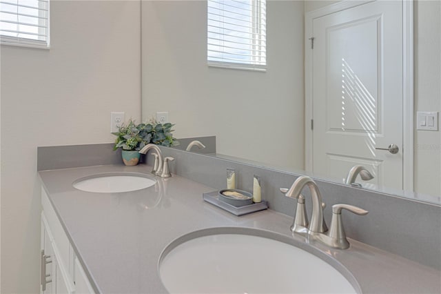 2760 Bookmark Dr, Kissimmee, FL 34746 - bathroom with double vanity and a sink