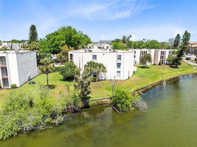 drone / aerial view with a water view