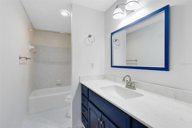 full bath featuring toilet, vanity, tile patterned floors, and shower / washtub combination