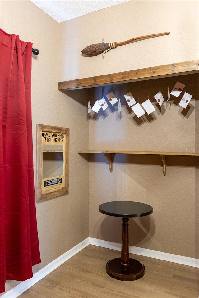 room details with wood finished floors and baseboards