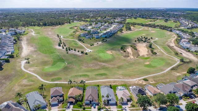 bird's eye view with golf course view and a residential view