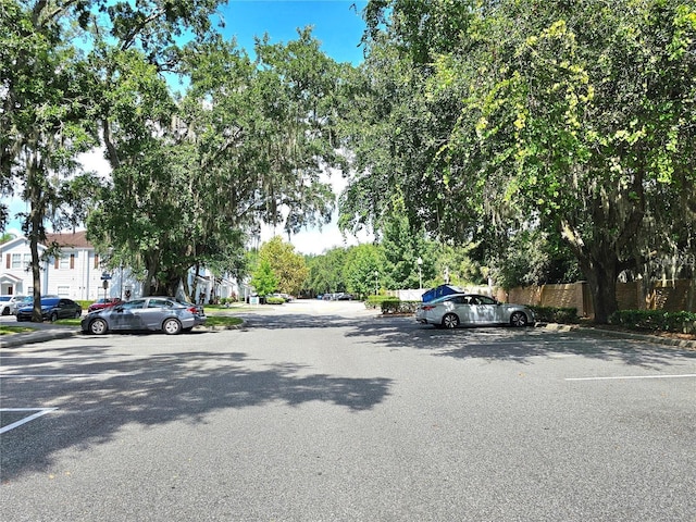 view of road featuring curbs