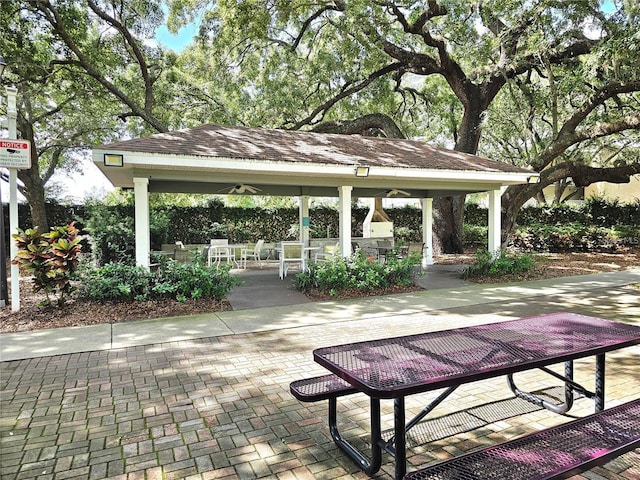 view of community featuring a gazebo and a patio