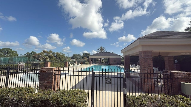 239 Longhirst Loop, Ocoee, FL 34761 - community pool with a patio area