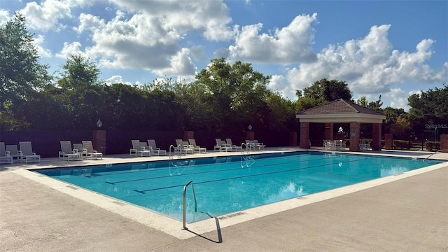 239 Longhirst Loop, Ocoee, FL 34761 - community pool with a gazebo and a patio area
