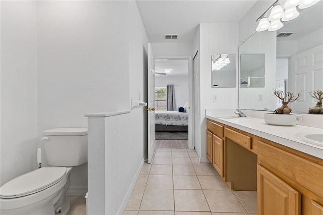 239 Longhirst Loop, Ocoee, FL 34761 - ensuite bathroom featuring double vanity and tile patterned flooring