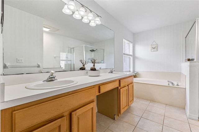 239 Longhirst Loop, Ocoee, FL 34761 - bathroom featuring a stall shower, double vanity, a garden tub, and tile patterned flooring