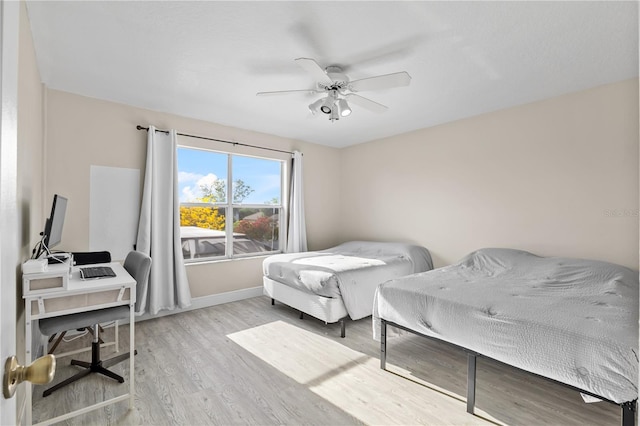 239 Longhirst Loop, Ocoee, FL 34761 - bedroom featuring wood finished floors, an office area, and ceiling fan