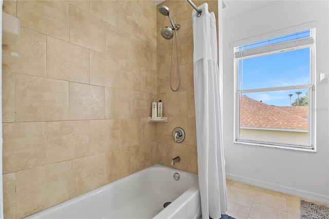 239 Longhirst Loop, Ocoee, FL 34761 - full bath featuring shower / bath combo with shower curtain and tile patterned flooring