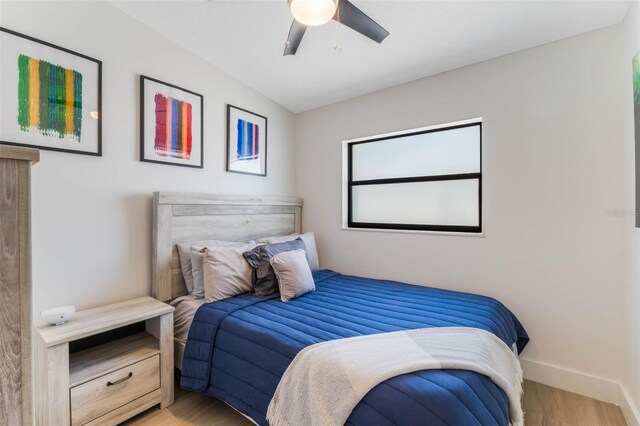 3204 Tradewinds Trl, Orlando, FL 32805 - bedroom featuring wood finished floors, baseboards, and a ceiling fan