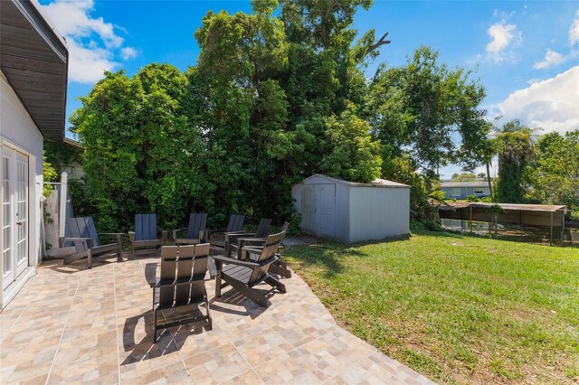 3204 Tradewinds Trl, Orlando, FL 32805 - view of green lawn with a patio area