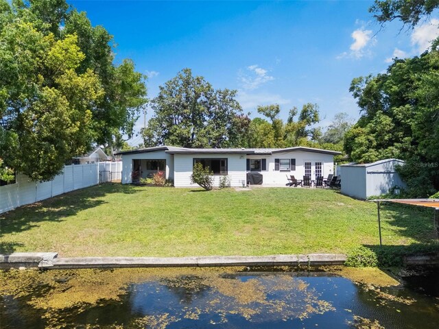 3204 Tradewinds Trl, Orlando, FL 32805 - back of property with a water view