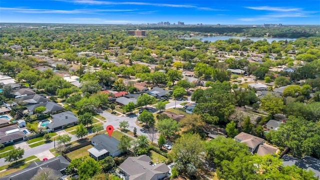 bird's eye view with a residential view and a water view