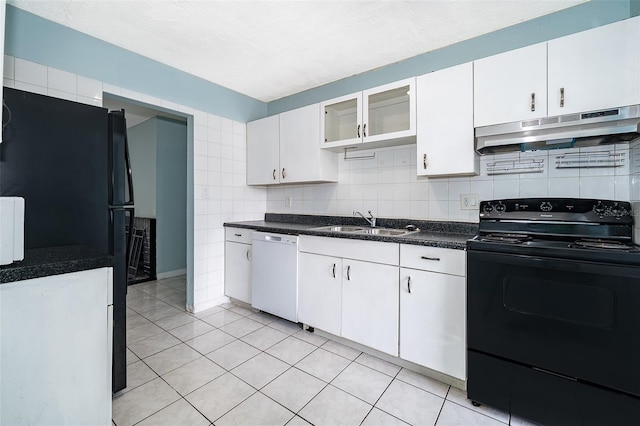 5060 Downing St Unit 6, Orlando, FL 32839 - kitchen with under cabinet range hood, black appliances, a sink, white cabinets, and light tile patterned floors