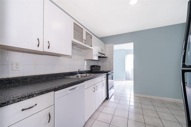 5060 Downing St Unit 6, Orlando, FL 32839 - kitchen with range, dishwasher, under cabinet range hood, white cabinetry, and backsplash