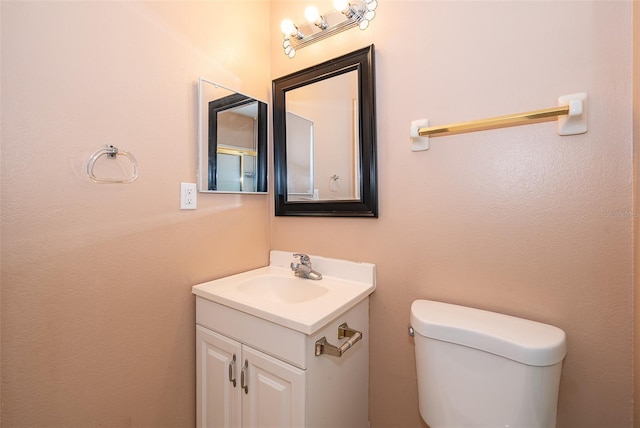 5060 Downing St Unit 6, Orlando, FL 32839 - half bathroom featuring toilet and vanity