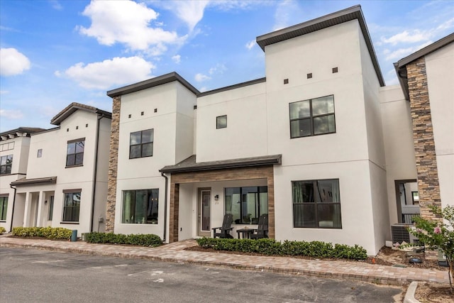 235 Villa Domani Cir, Davenport, FL 33896 - townhome / multi-family property featuring stucco siding