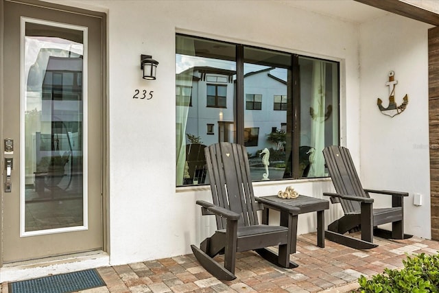 235 Villa Domani Cir, Davenport, FL 33896 - entrance to property featuring stucco siding