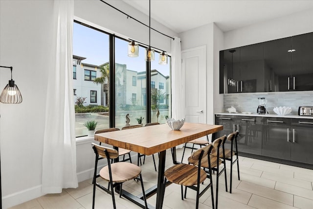 235 Villa Domani Cir, Davenport, FL 33896 - dining space with baseboards and light tile patterned floors