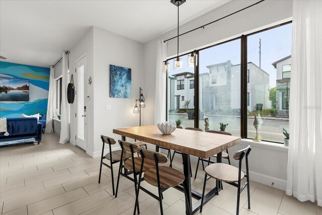 235 Villa Domani Cir, Davenport, FL 33896 - dining space with baseboards