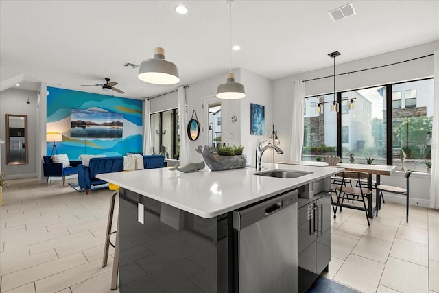 235 Villa Domani Cir, Davenport, FL 33896 - kitchen with dishwasher, light countertops, pendant lighting, recessed lighting, and open floor plan