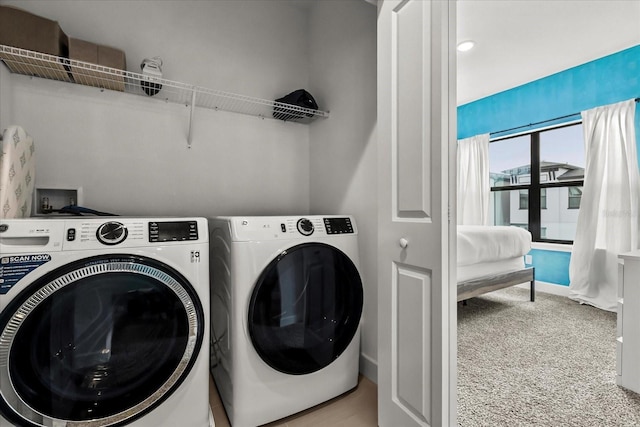 235 Villa Domani Cir, Davenport, FL 33896 - washroom with washer and clothes dryer and carpet flooring
