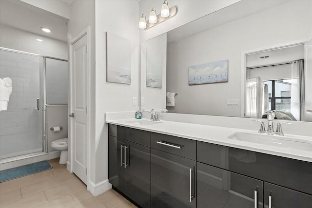 235 Villa Domani Cir, Davenport, FL 33896 - bathroom with double vanity, a shower stall, connected bathroom, and tile patterned flooring