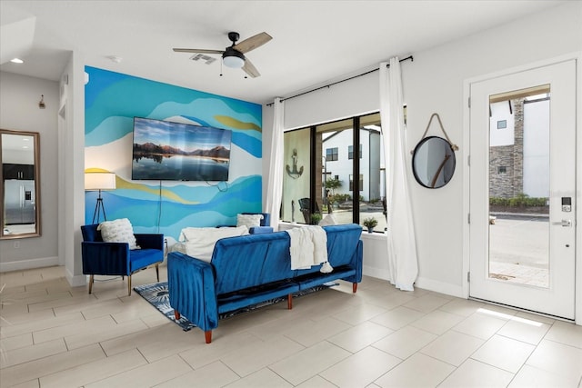 235 Villa Domani Cir, Davenport, FL 33896 - bedroom featuring stainless steel fridge, access to exterior, and ceiling fan