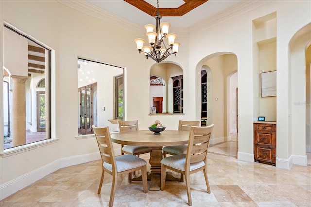 3412 Lilas Ct, Windermere, FL 34786 - dining area with a chandelier, arched walkways, ornamental molding, and plenty of natural light