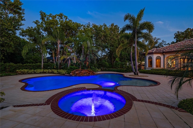 3412 Lilas Ct, Windermere, FL 34786 - view of swimming pool featuring a patio and a pool with connected hot tub