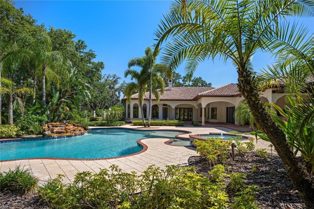 3412 Lilas Ct, Windermere, FL 34786 - view of swimming pool with a patio area and a pool with connected hot tub
