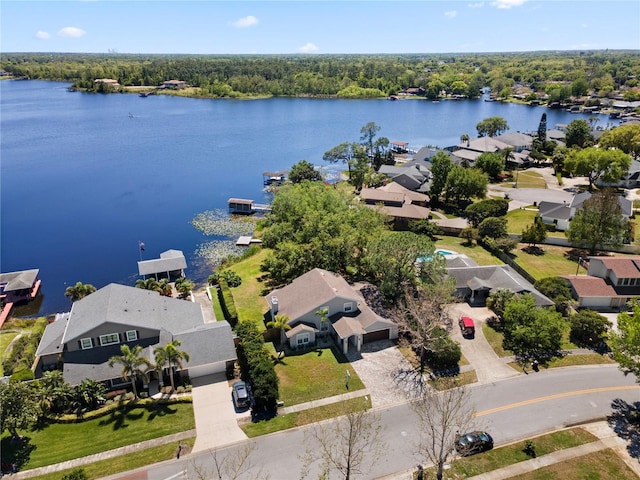 8616 Port Said St, Orlando, FL 32817 - birds eye view of property with a forest view, a residential view, and a water view