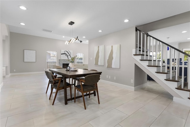 8616 Port Said St, Orlando, FL 32817 - dining area with visible vents, baseboards, recessed lighting, and stairs