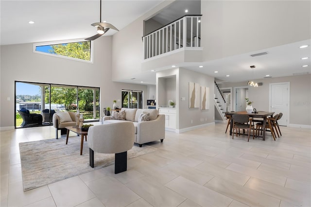8616 Port Said St, Orlando, FL 32817 - living room with recessed lighting, stairway, visible vents, and baseboards