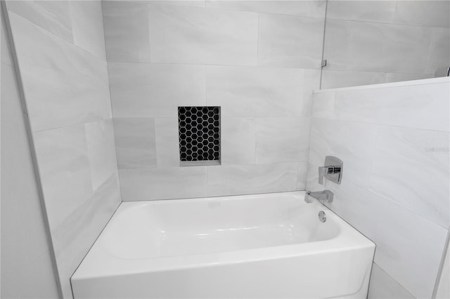 8616 Port Said St, Orlando, FL 32817 - bathroom with a tub and walk in shower
