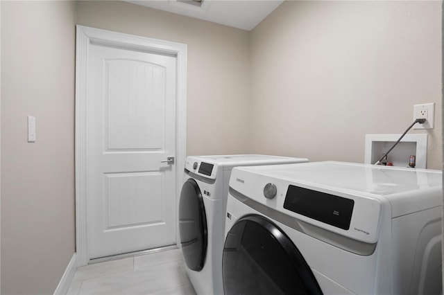 8616 Port Said St, Orlando, FL 32817 - laundry area featuring washer and dryer and laundry area