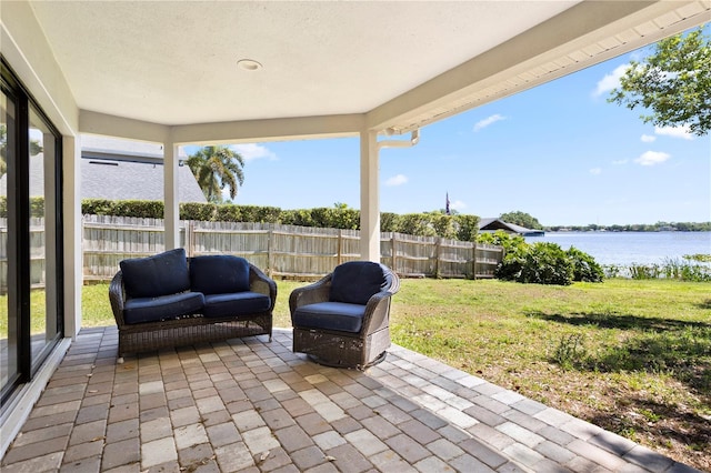 8616 Port Said St, Orlando, FL 32817 - view of patio / terrace with a water view and fence